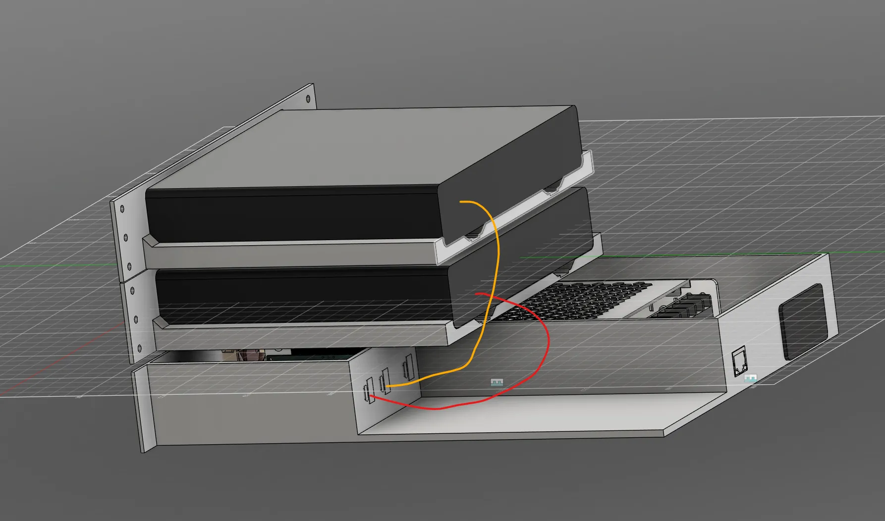CAD view of two computers mounted above the power enclosure, with colored lines indicating cable routes
